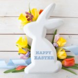 White easter bunny with fresh spring flowers